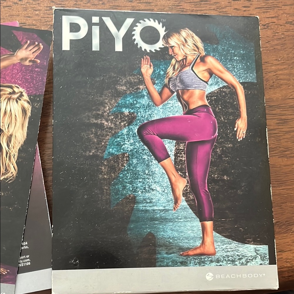 Beachbody PiYo Fitness DVD with Pink and Gray Accents